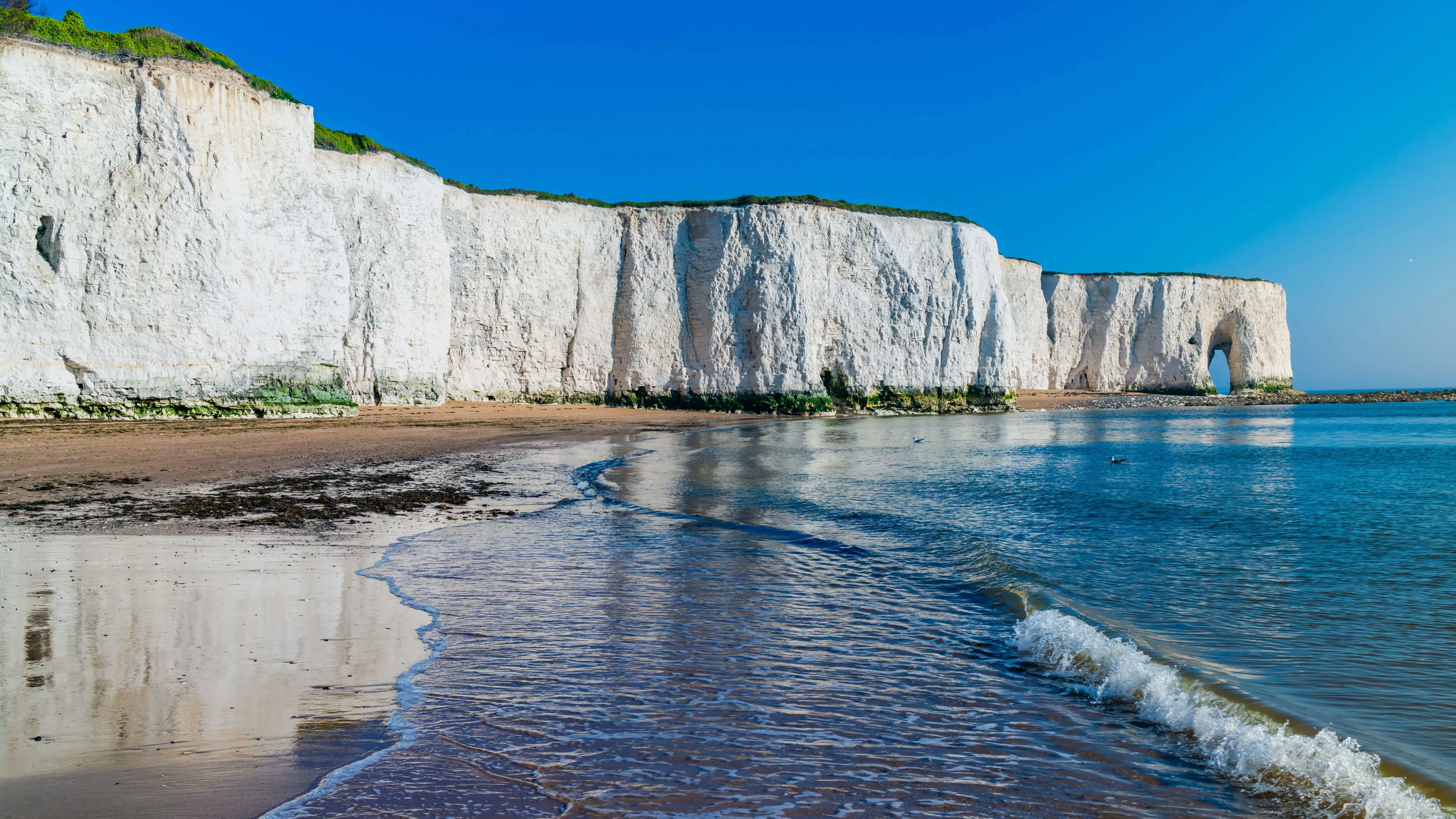 White Chalk Cliffs And Beach In Kingsgate Bay, Margate, East Kent