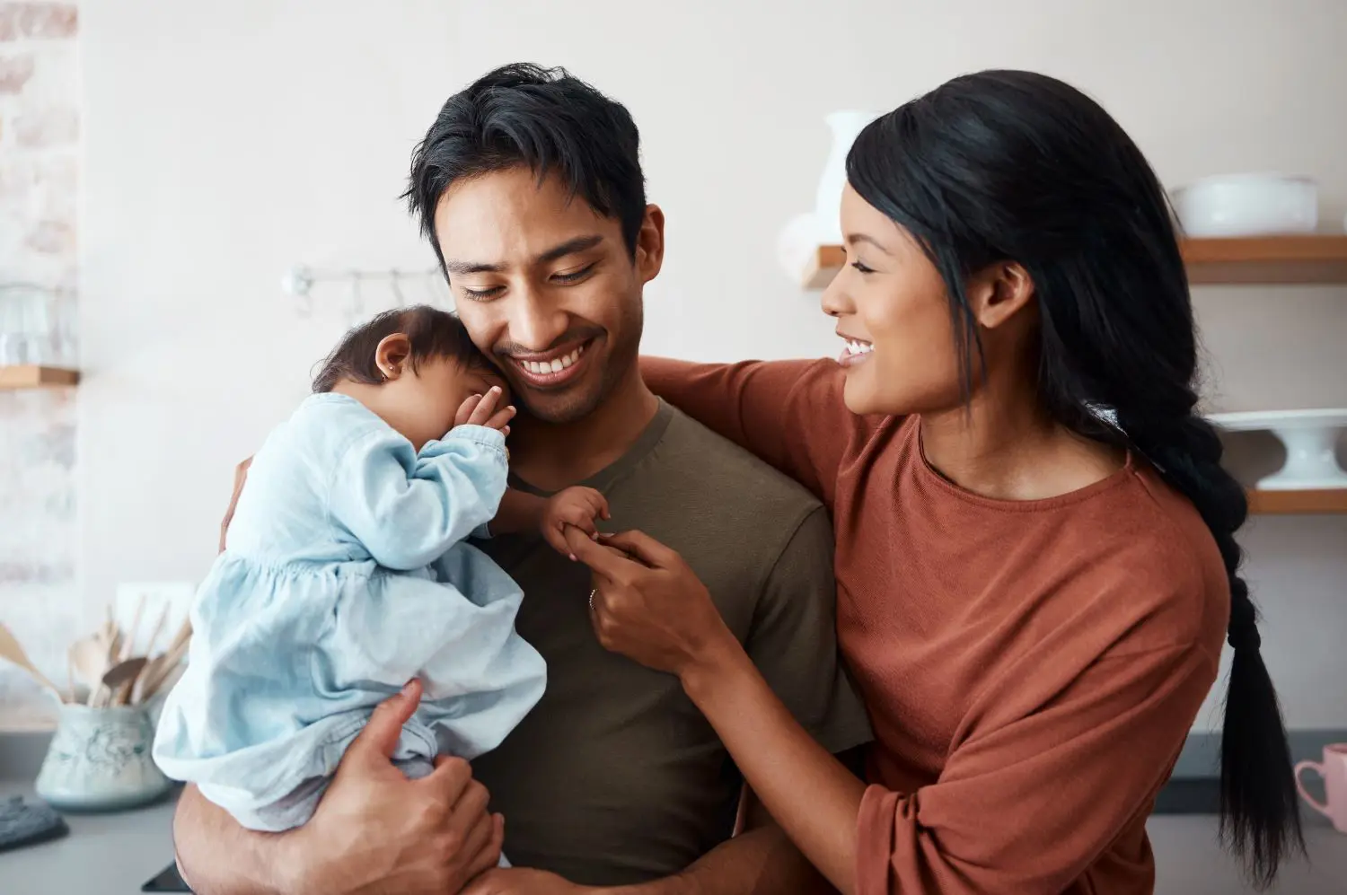 family holding their baby