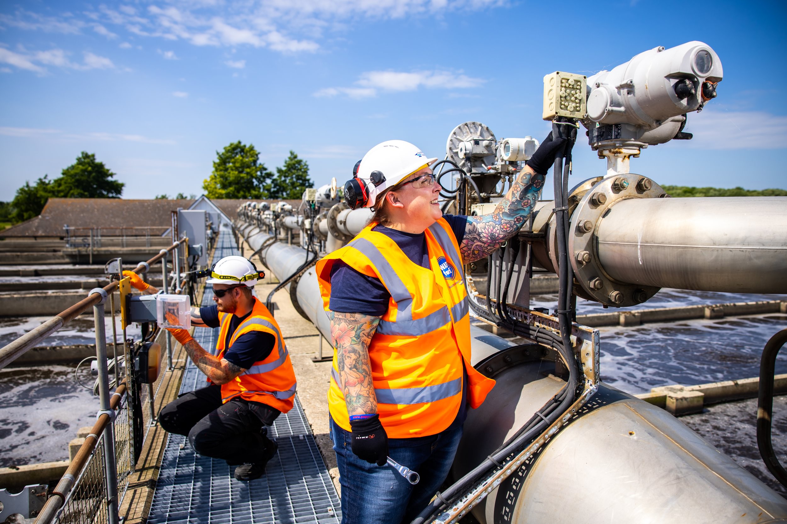 Lady and man working at Southern Water Weatherlees Hill WTW 
                        