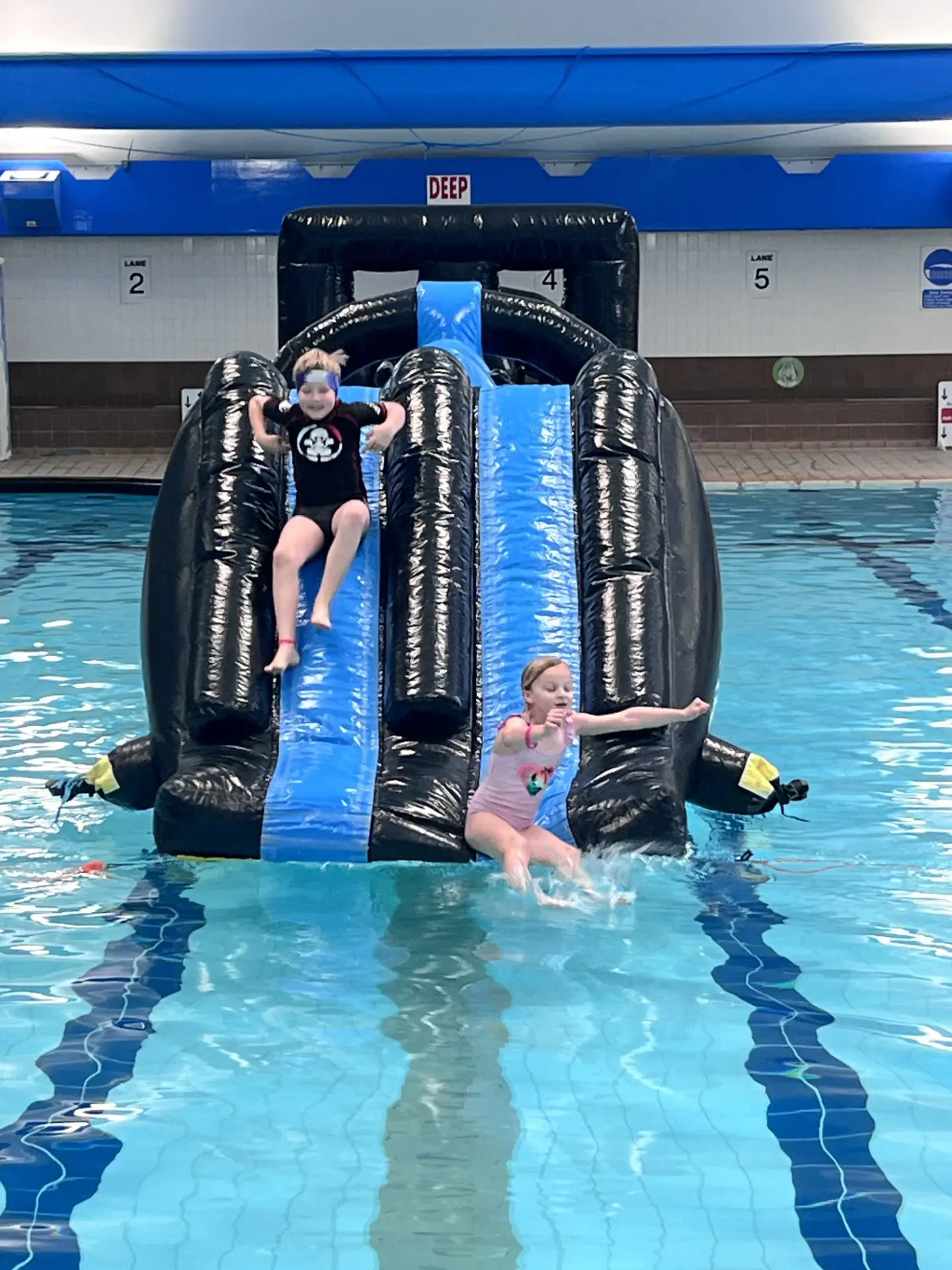 Inflatable slide at Hastings free swim session
